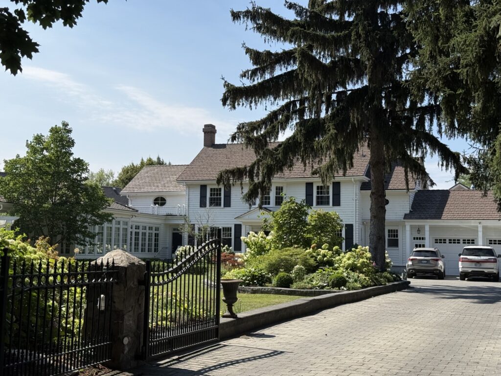 Adams House at 1998 Abbott Street, a Georgian Revival residence in Kelowna's Heritage Conservation Area